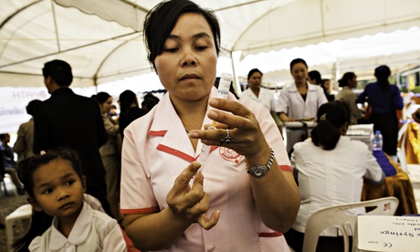 Woman giving vaccine