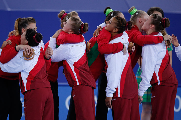 Tom Jenkins day six: England and Wales gymnasts hug