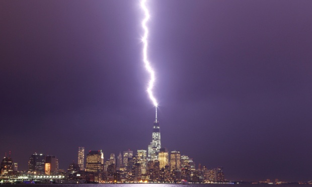 Lightning hits One World Trade Center in Lower Manhattan during an evening storm in New York