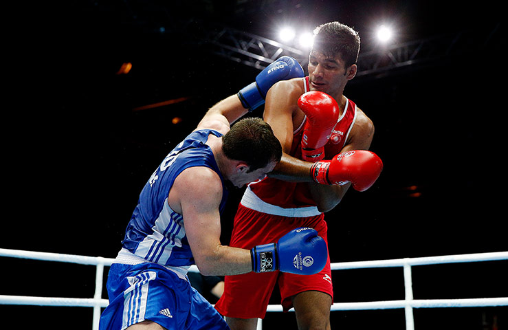 boxing: Stephen Lavelle of Scotland cowers 