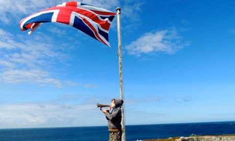 blowing the bugle after raising the union flag at Fort Clonque, Alderney