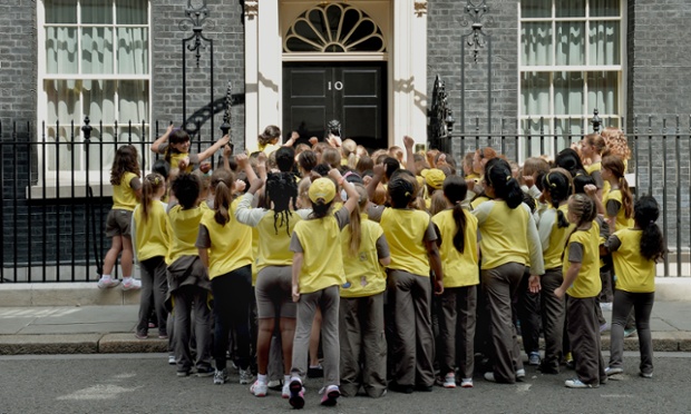 Brownies arrive for a reception hosted by the Prime Minister David Cameron to celebrate the centenary of the Brownies at Downing Street, central London.