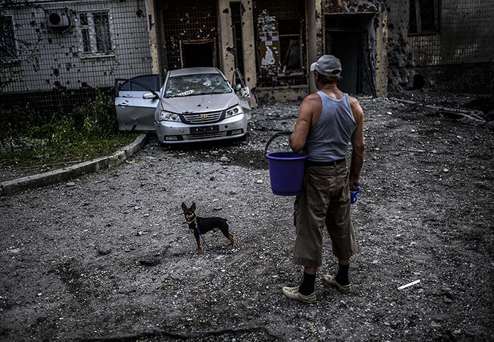 20 photos: A man with his dog in Donetsk