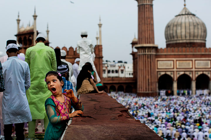 20 photos: A young Indian Muslim yawns during Eid al-Fitr 
