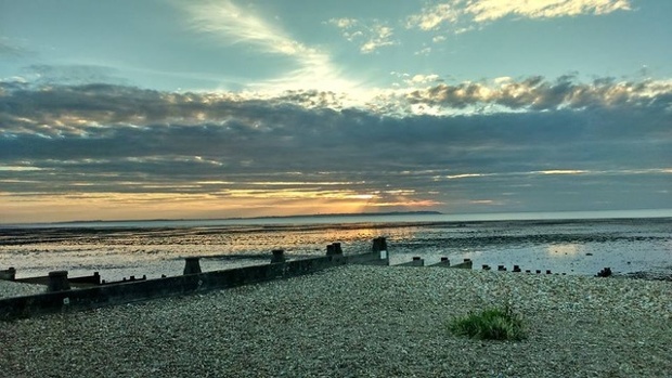 'Sunset over Whitstable at low tide.'
