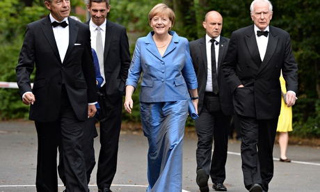 A smiling Angela Merkel arrives at the Bayreuth opera festival