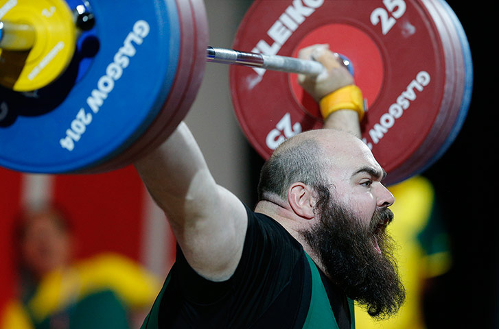 weightlifting: Damon Kelly of Australia makes a successful lift