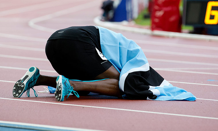 Athletics at Ibrox: Amos is wrapped in the Botswanan flag