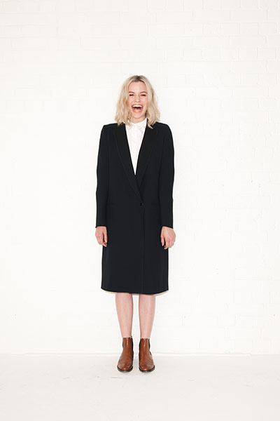 All Ages androgynous: black coat white shirt brown chelsea boots