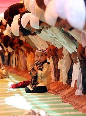 Muslim devotees offer prayers on the first Friday of Ramadan at Taj-ul Mosque in Bhopal, India