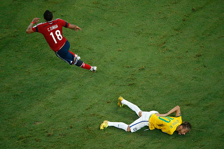 Brazil v Colombia: Juan Camilo Zúñiga of Colombia runs after fouling Neymar