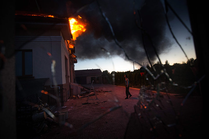 20 photos: Aftermath of shell attack on Lugansk suburbs