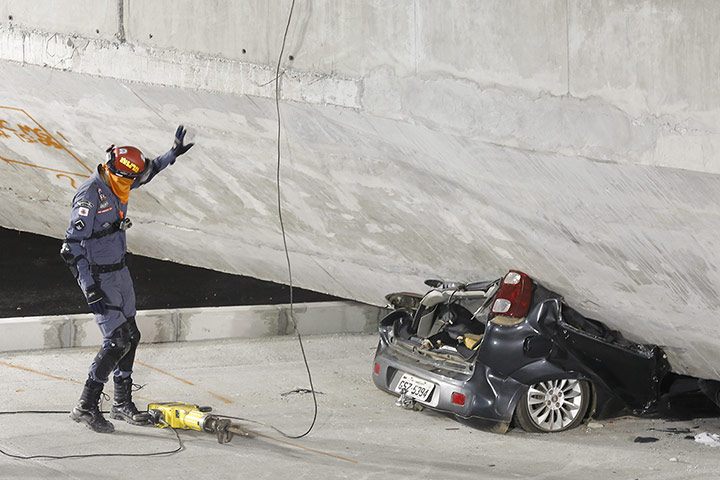 20 photos: A car crushed underneath a collapsed bridge in Belo Horizonte, Brazil