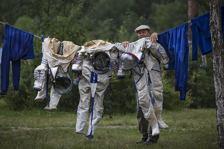 20 photos: An employee of the Russian Space Training Centre hangs out space suits