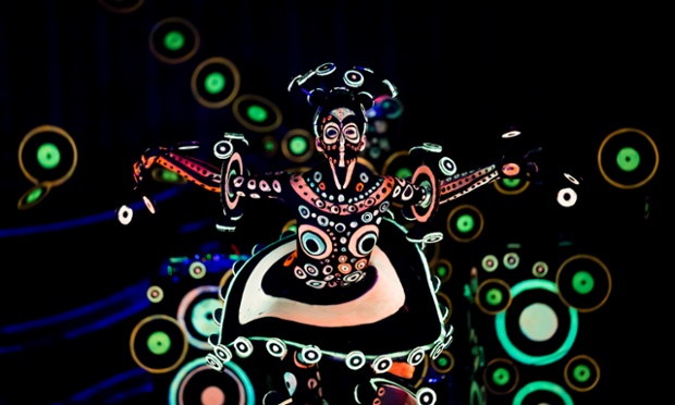 Poertschach Am Woerthersee, Austria: A model poses at the flouro award at the World Bodypainting Festival.