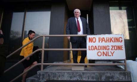 Palmer united Party leader Clive Palmer arrives at their offices at the National Press Club building for an early morning meeting of the party prior to the first day of sitting for the new Senate.