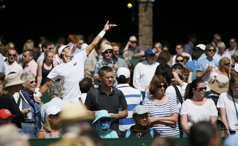 Wimbledon Best: Spectators watch matches on outside courts at Wimbledon