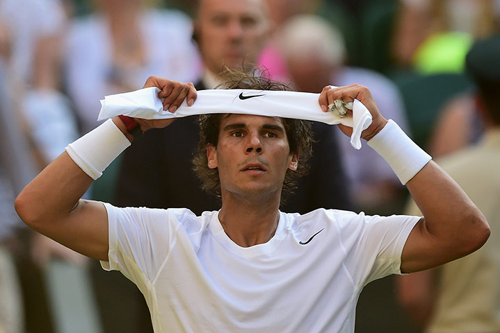 Wimbledon Best: TOPSHOTS Spain's Rafael Nadal adjusts hi