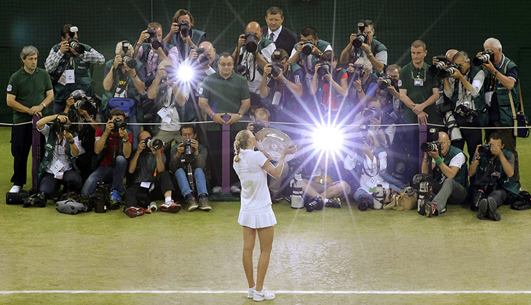 Wimbledon Best: Petra Kvitova of Czech Republic kisses the winner's trophy