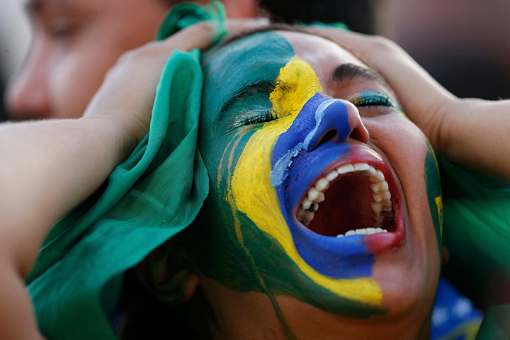 Mourning Brazil: Fans of Brazil react while watching the 2014 World Cup semi-final