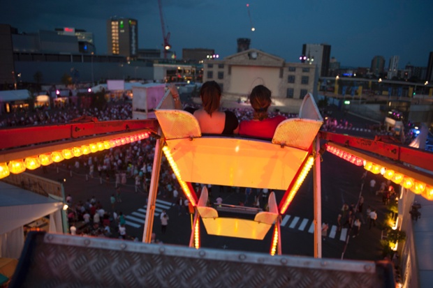 Members of the audience watch Back to the Future high up on a Ferris Wheel when they attended a screening in London organised by Secret Cinema.