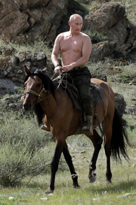 Vladimir Putin rides a horse in southern Siberia in 2009.