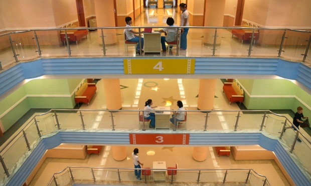 The lobby of the dormitory at the Songdowon International Children's Camp is painted in pastel colors, Tuesday, July 29, 2014, in Wonsan, North Korea. The camp, which has been operating for nearly 30 years, was originally intended mainly to deepen relations with friendly countries in the Communist or non-aligned world. But officials say they are willing to accept youth from anywhere - even the United States.