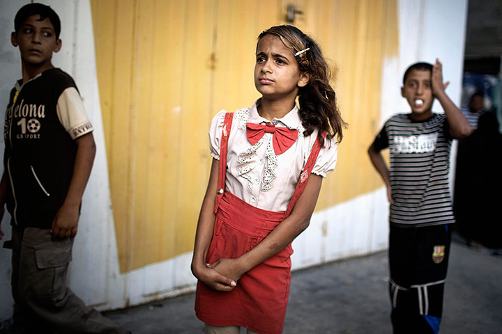 20 photos: Palestinian children look at the scene of an explosion