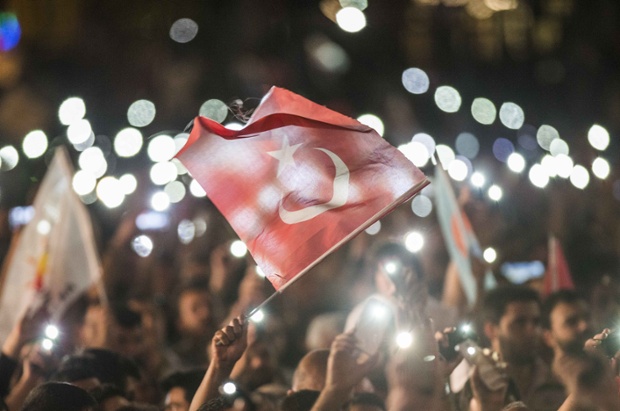 People celebrate Recep Tayyip Erdogan's presidential victory in Ankara, Turkey