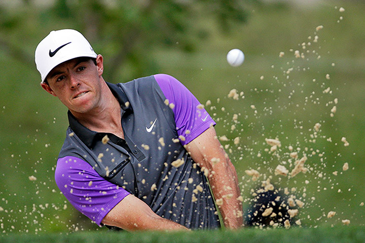 Rory McIlroy US PGA Open: Rory McIlroy, of Northern Ireland, powers out of a bunker on the sixth.