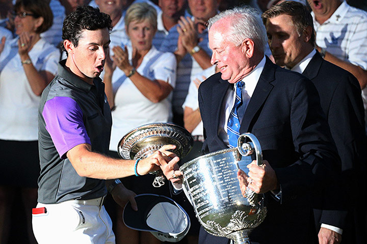 Rory McIlroy US PGA Open: Rory McIlroy catches the Wanamaker Trophy as it slips out of the hands of P