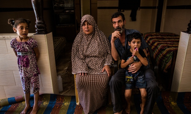Mohamed Bakr and his wife, Sahar, with their children. The family lost one of their sons during the air strike on Gaza Citys beach