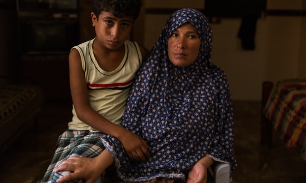 Sawla Bakr and her son Said. Sawlas other son, Mohamed, was killed on Gaza City beach while Said was playing with him