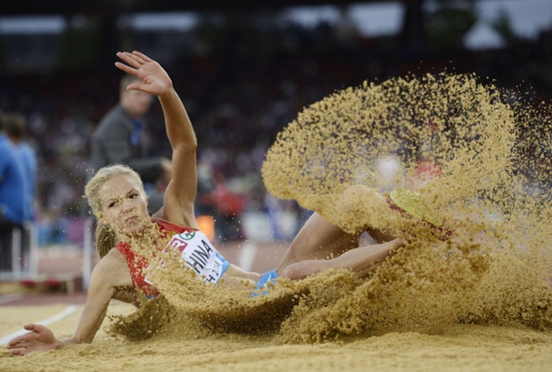 Russia's Darya Klishina competes in the Women's long jump qualifying round during the European Athletics Championships at the Letzigrund stadium in Zurich, Switzerland.