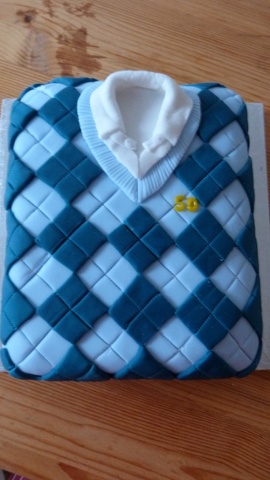 '50th Birthday tank top cake: My friend and colleague Francis has a tank top exactly like this, so I made this for his 50th birthday. He was totally amazed and delighted, and as it was my first attempt at a cake like this, so was I!'
