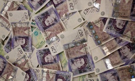 Pile of Twenty Pound and Five Pound Notes