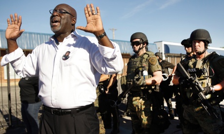 protestor hands up ferguson