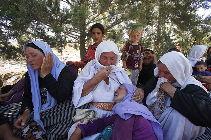 20 Photos: Displaced Yazidis mourn the death of a family member in Fishkhabour