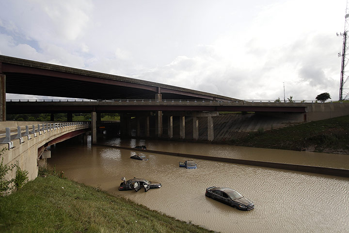 20 Photos: Vehicles are abandoned in Royal Oak, Michigan, after flash flooding