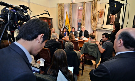 Julian Assange with Ecuador's foreign minister Ricardo Patiño at a press conference