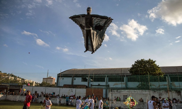 A batman kite is flown during the 30th kite-flying festival in Sao Goncalo, a surburb of Rio de Janeiro, Brazil