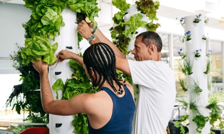 Stephen Ritz working on vertical planters with students