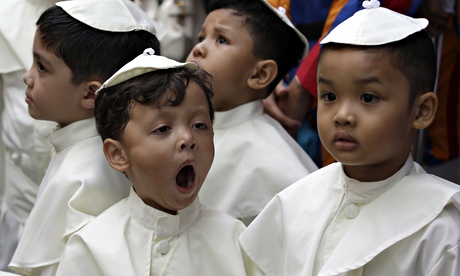 boys prepare to join a parade in the Vatican. Photograph: AP/Bullit Marquez