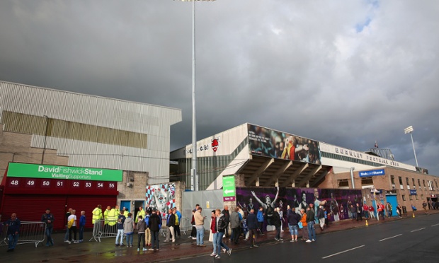On 17 August 2013, Burnley were at home to Yeovil Town. A year on, they host Chelsea in the Premier League. Here, fans arrive early at Turf Moor for their first match back in the top flight.