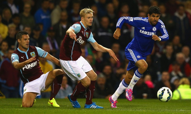 Chelsea are in control at the beginning of the second half. Here, Diego Costa breaks away from Jason Shackell and Ben Mee.