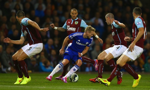 Andre Schurrle tries to find a way through the Burnley defence as Chelsea remain in control.