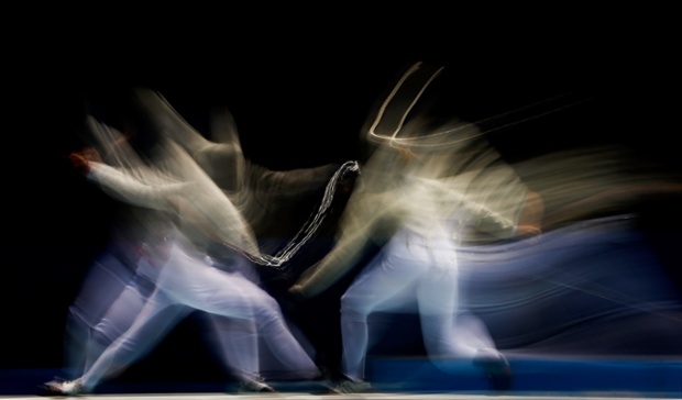 Chiara Crovari of Italy (R) and Alina Moseyko of Russia compete in the Women's Sabre Individual Final on day three of the Nanjing 2014 Summer Youth Olympic Games at Nanjing International Expo Centre in Nanjing, China.