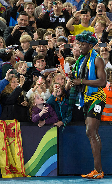 Usain Bolt by Tom Jenkins: Usain Bolt with a tartan hat
