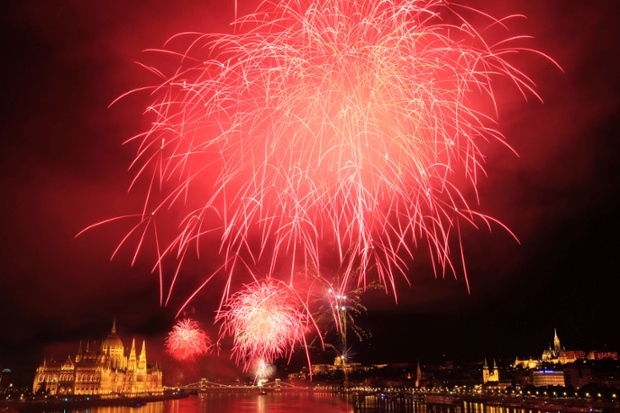Fireworks explode over the Danube river during Saint Stephen's Day in Budapest