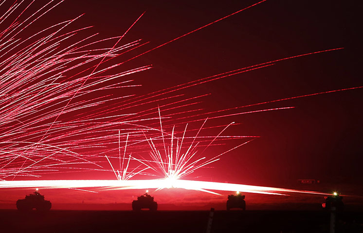 20 Photos: Bullets ricochet during an annual training exercise in Gotemba, Japan